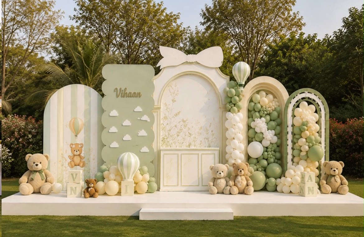 Pastel ring theme birthday decoration with glowing milestone neon sign and flower arches