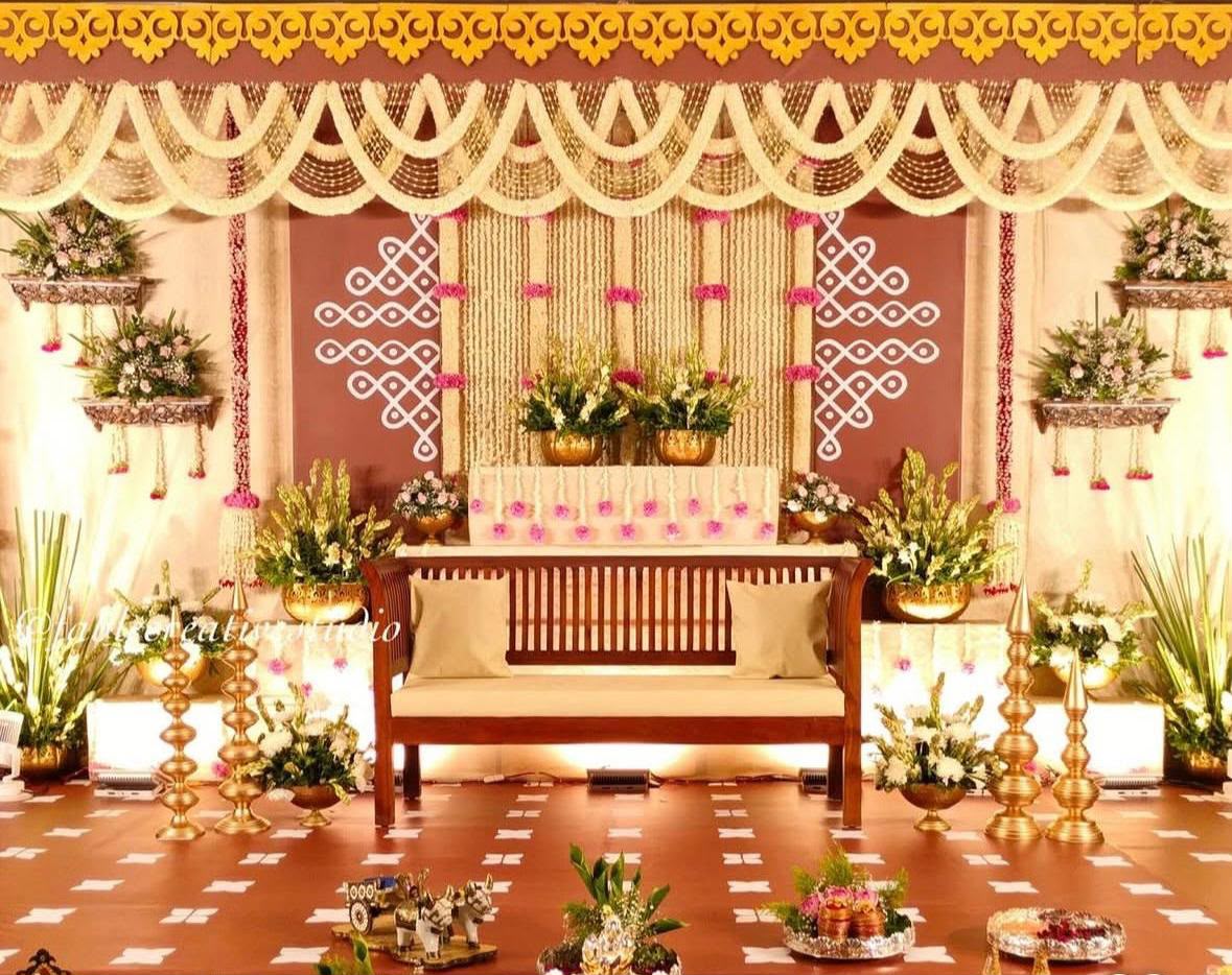 Elegant engagement aisle decor with mirrored pedestals and exotic fresh blooms