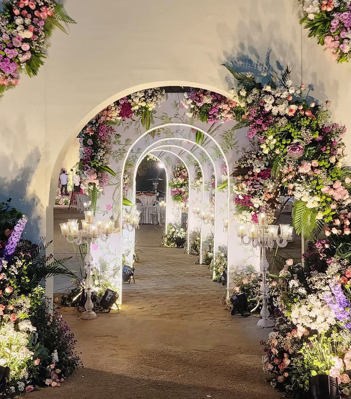 Bespoke floral centerpiece and dining tablescape for engagement feast