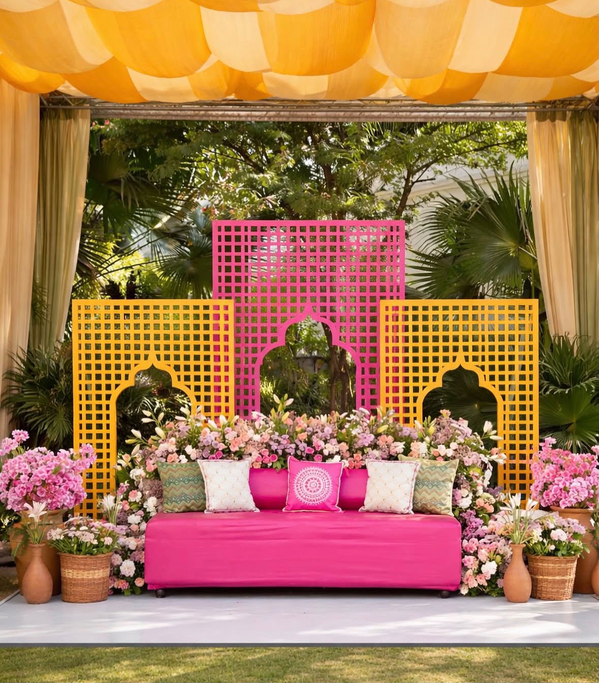 Traditional mangala snanam setup with brass lotas and floral garlands
