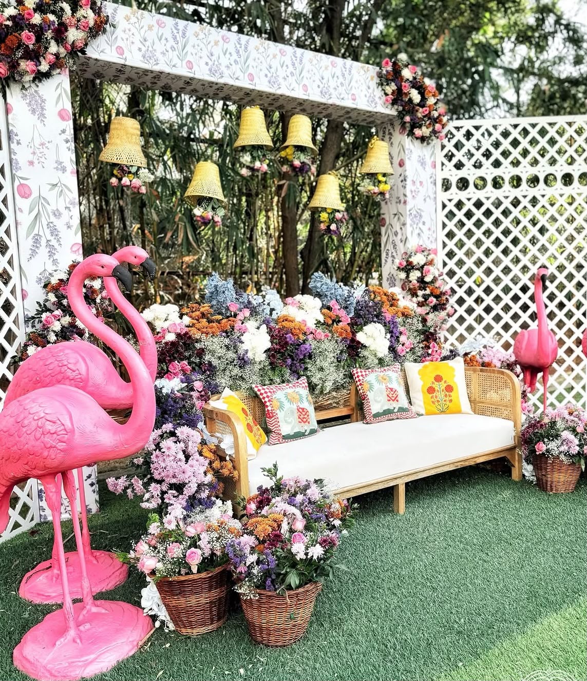 Whimsical flamingo and wildflower haldi lounge setting