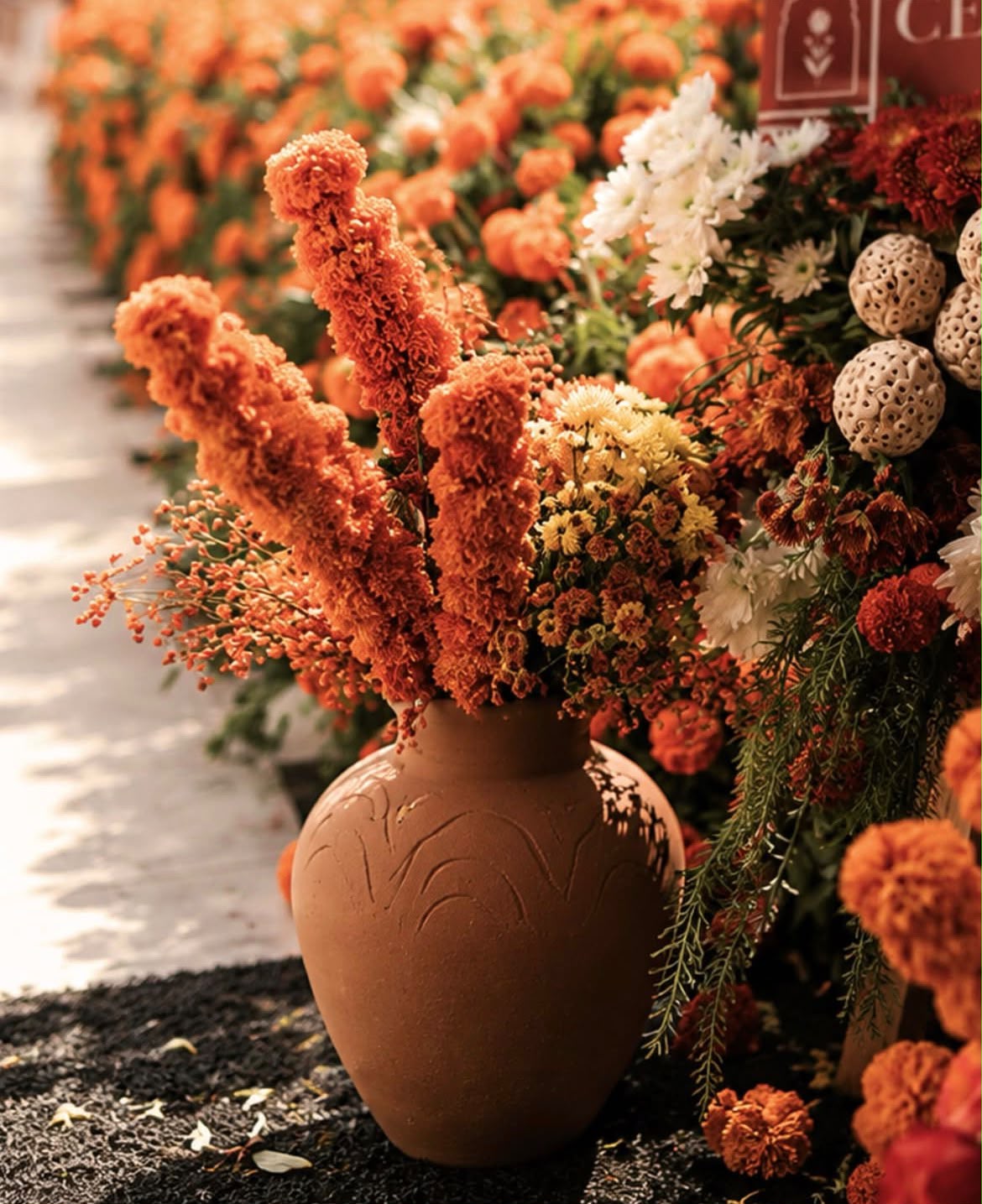 Auspicious housewarming pestle & mortar ritual area decorated with sacred rangoli art