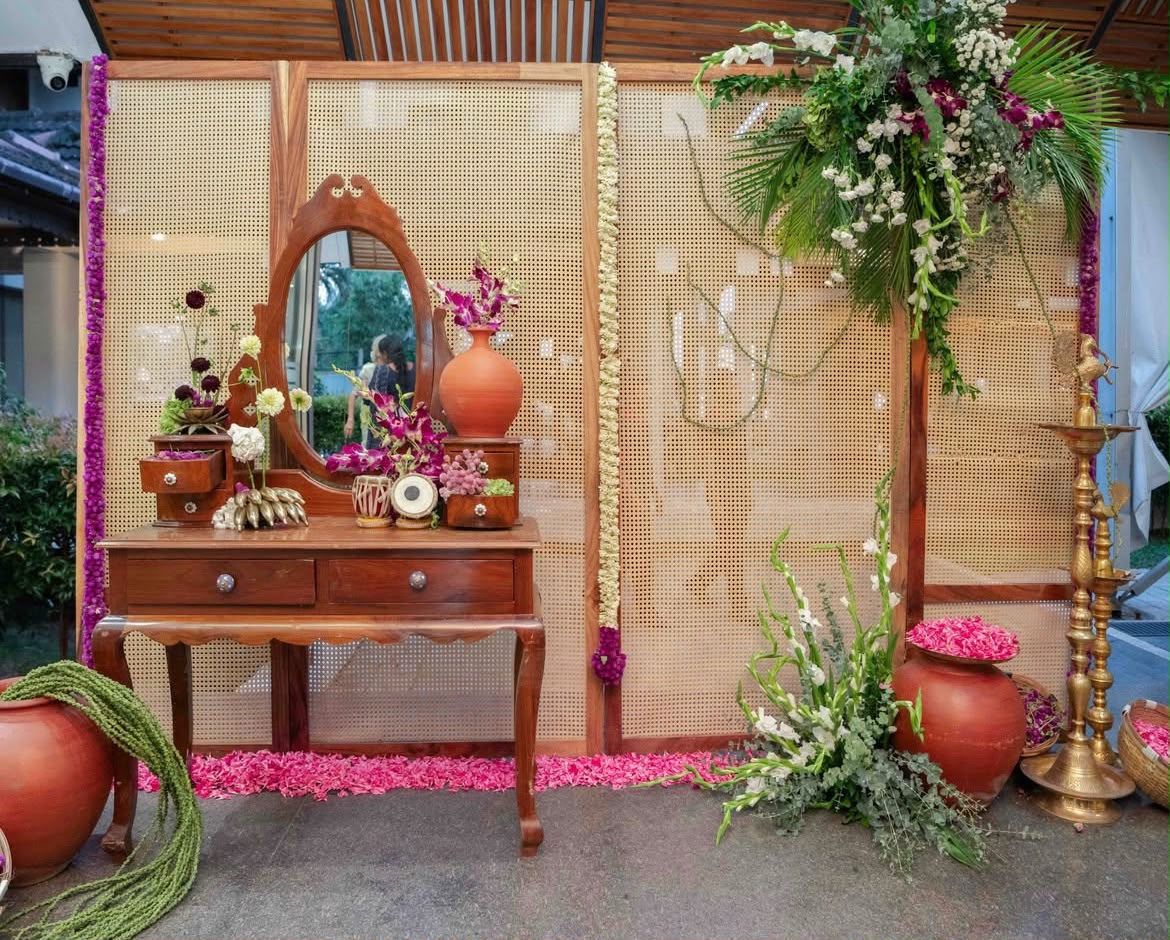 Intimate indoor family anniversary celebration decor with soft lighting and cascading greenery