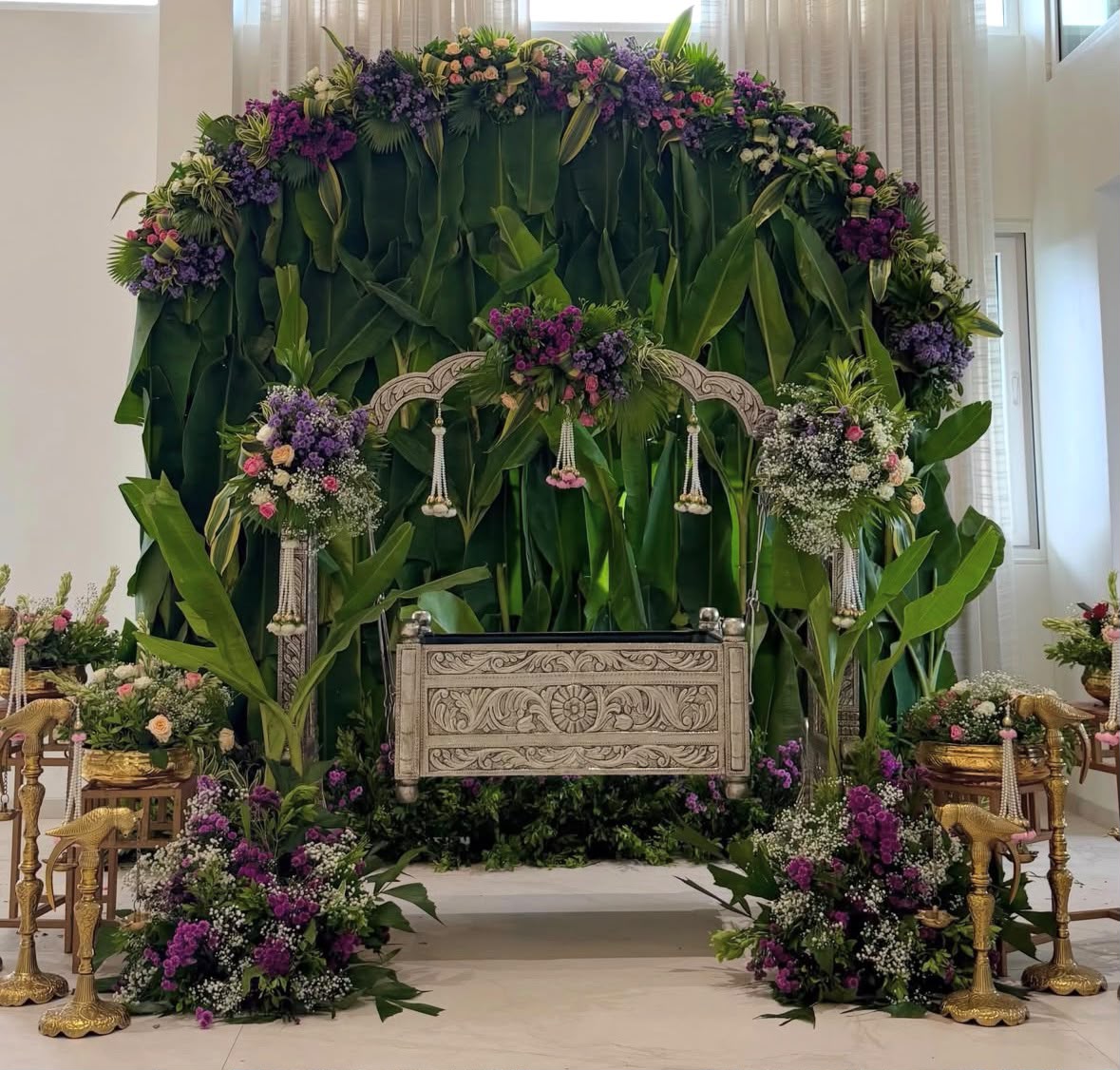 Classical South Indian cradle naming ceremony (Barasala) with silver swing and lotus florals