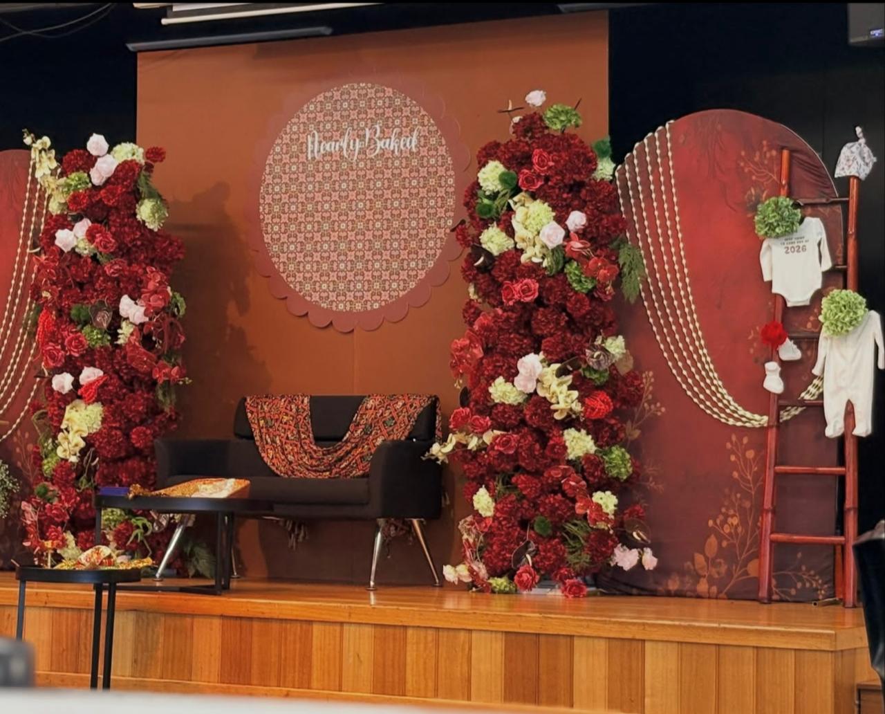 Auspicious festive setup featuring Lord Ganesha deity idol enveloped in fresh white jasmine strings