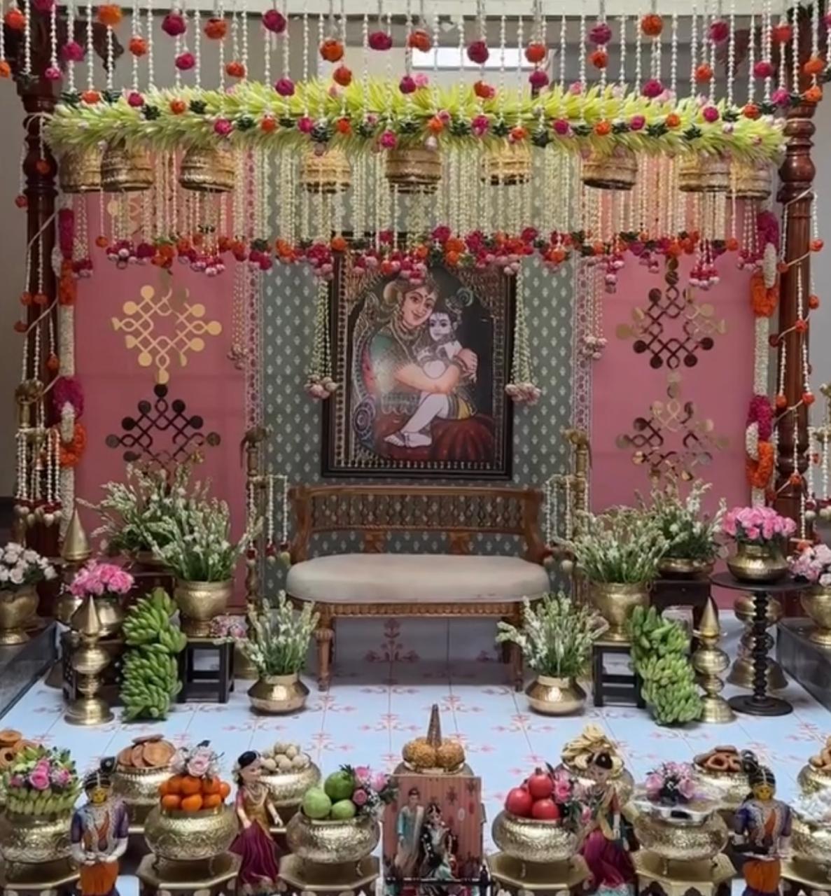 Heritage home courtyard festival decoration with vibrant floral rangoli carpets