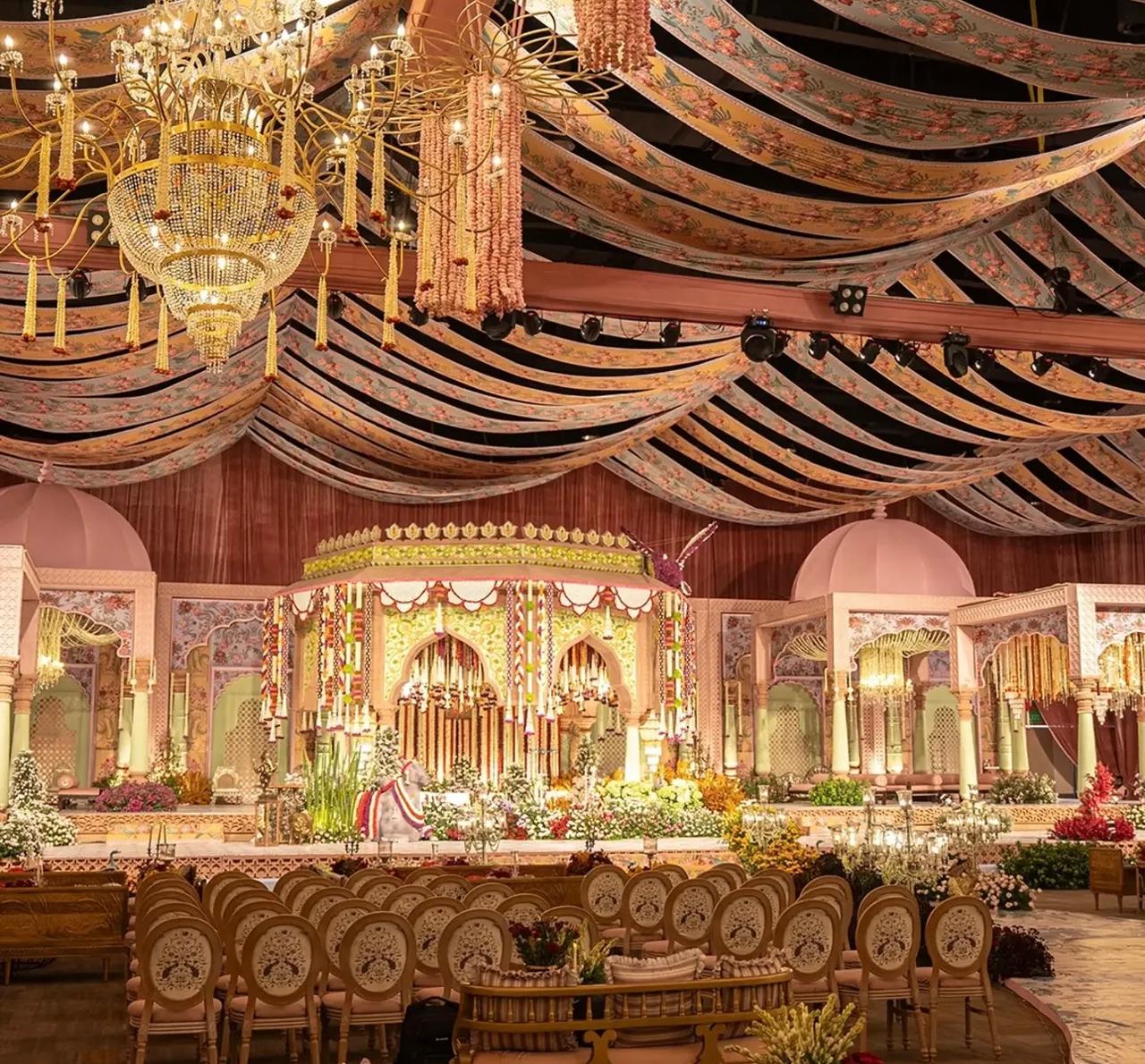 Romantic lavender floral stage with concentric arches and sparkling crystal chandeliers
